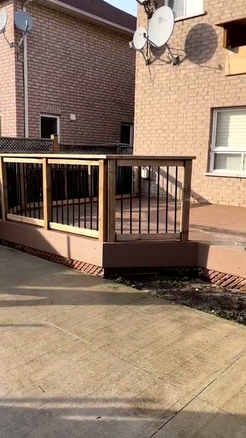Composite deck and railing — Global Construction Homes job site